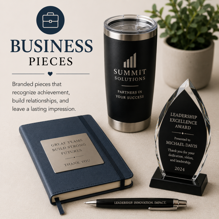 Promotional business items including a notebook, tumbler, pen, and award.